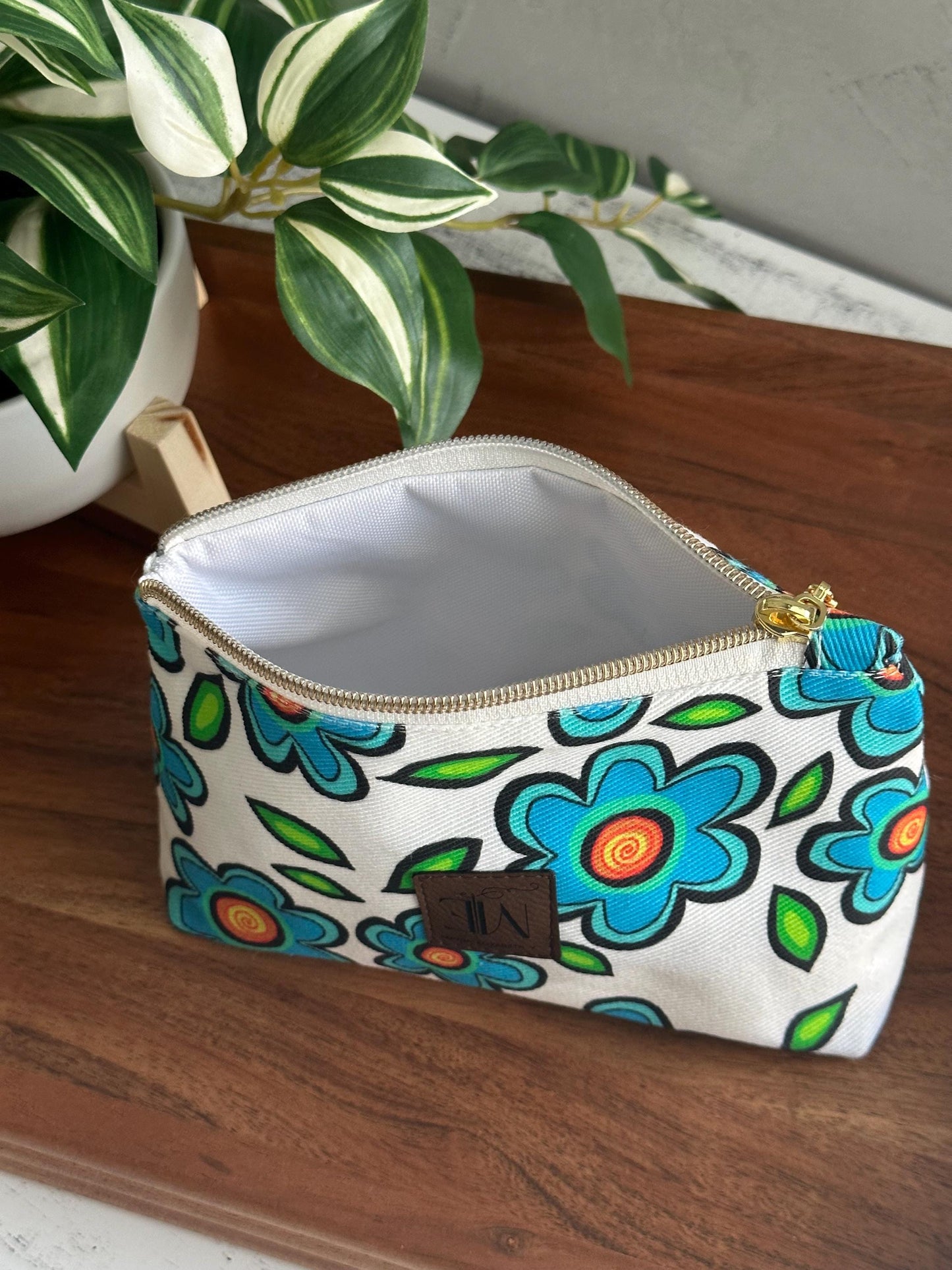 Blue flowers on white make up bag